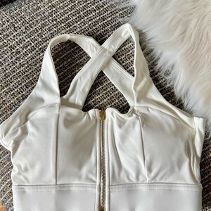 Elegant Cream Sleeveless Top with Zipper